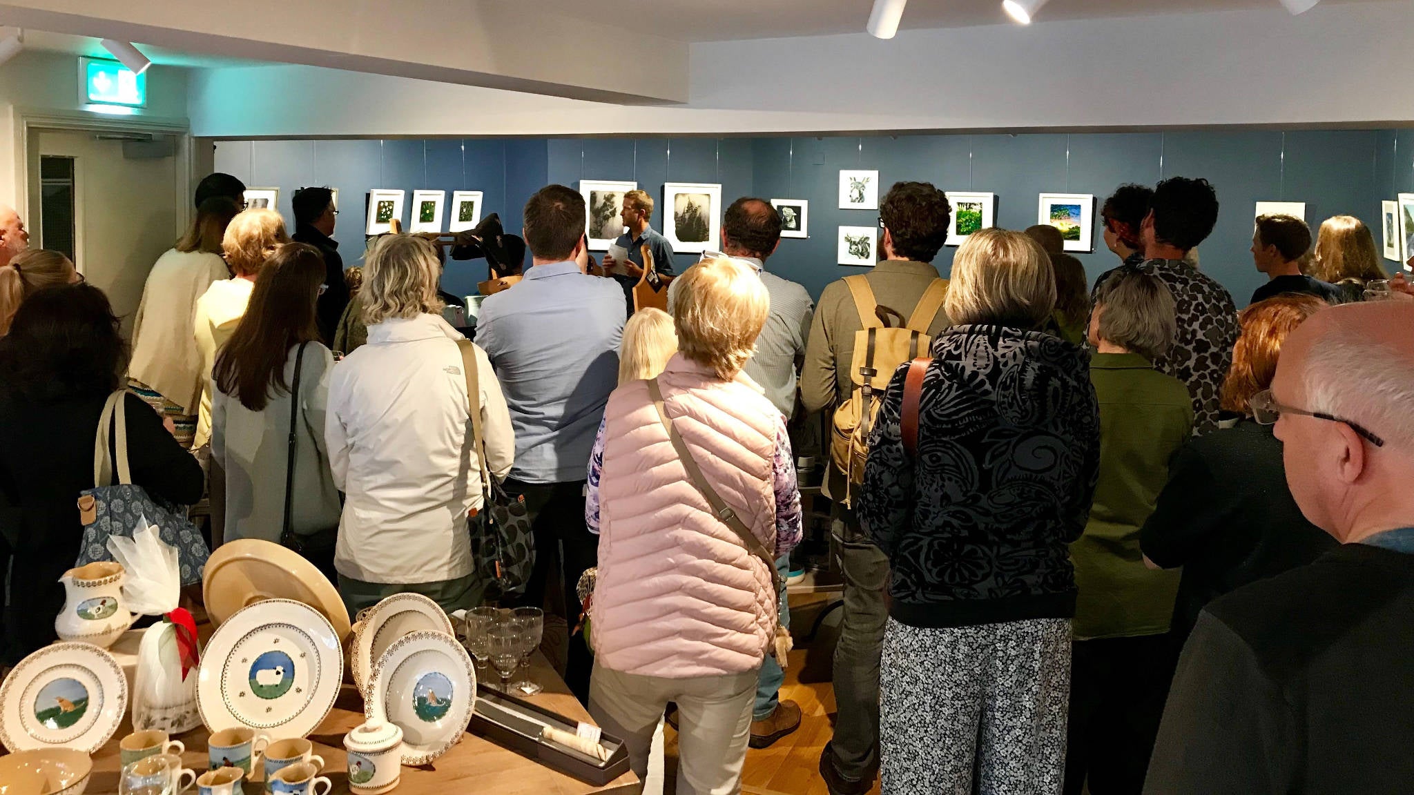 Artist giving talk in the gallery space